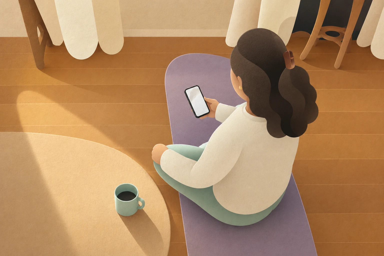 Person sitting with a phone and coffee in warm morning light
