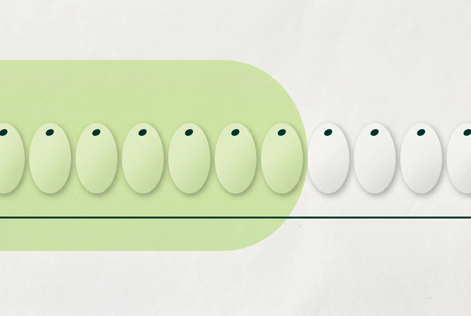 A row of small identical cards on a light surface with a pale green translucent band sweeping over the first two thirds